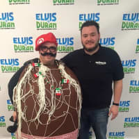 <p>Robert Atkinson, of Mima&#x27;s Meatballs &amp; More, and a costumed friend celebrate National Meatball Day.</p>