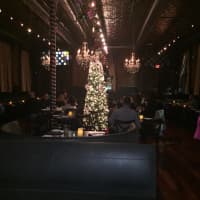 <p>The dining room at Modern on the Rails is decorated for the holidays.</p>