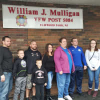 <p>Kathryn Mulligan is flanked by sons Tom, Pat, Billy, daughter-in-law Linda, and grandchildren Matty, Biily Jr. and Kayla.</p>