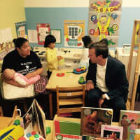 <p>U.S. Sen. Chris Murphy talks with one of the teachers at the Head Start classroom at ABCD in Bridgeport. </p>