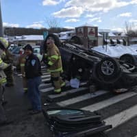 <p>An airbag is seen outside a window of the rolled over vehicle. The accident happened on Route 6 in front Bethel&#x27;s Big Y supermarket.</p>