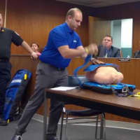 <p>ZOLL Medical&#x27;s Roi Klipper demonstrates to the North Arlington Borough Council how the NAVES AutoPulse Resuscitation System works. NAVES used the AutoPulse to save a man&#x27;s life the day it went into service.</p>