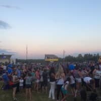 <p>A large crowd awaits a fireworks show by Nanuet High School sponsored by the Town of Clarkstown.</p>