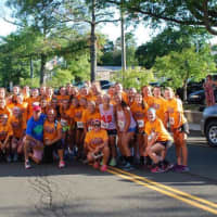 <p>A team of runners takes a picture prior to Friday&#x27;s All Out for Autism Race in New Canaan.</p>