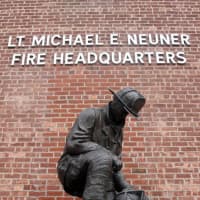<p>Brewster firefighters marked the anniversary of the death of Lt. Michael E. Neuner Wednesday. Neuner, a 35-year-old volunteer, died after being trapped in the basement at a house fire in 1997.</p>