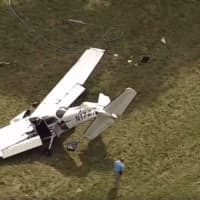 <p>The plane crashed near the Candlelight Farms Airport in New Milford. It had taken off early from Danbury Municipal Airport. Aerial photo courtesy of NBC Connecticut.</p>