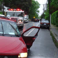 <p>The Fire Department deals with the aftermath of a crash on East Avenue near Nelson Avenue. </p>