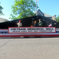 <p>This float commemorates the Vietnam Memorial Wall and the soldiers lost in that war. </p>