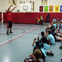 <p>Harlem Wizard David Paul visited Ridgefield&#x27;s Scotland Elementary school and held them in thrall as he performed his tricks and played games with them.</p>