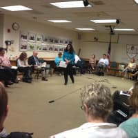 <p>Scarsdale School Board President Liz Guggenheimer leads the first of two public forums on the 2013-2014 budget. </p>