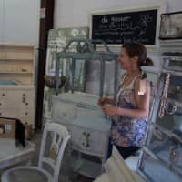 <p>Denise Haughton of Trumbull took her vintage furniture business, Du Grenier, to the PopShop Market in Fairfield Saturday.</p>