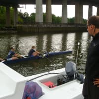 <p>Greenwich Crew girls head coach Marko Serafimovski gives instructions to one of his teams at a recent practice.</p>