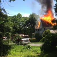<p>The Chappaqua home at 33 Carolyn Place was engulfed in flames Wednesday.</p>