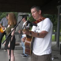 <p>Bill Steeley and Where&#x27;s Dave&#x27;s guitarist (back center) Bruce Rose also books the bands for Concert in Flint Park.</p>