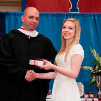 <p>Julia Meyer of Chappaqua is presented the Spanish Prize by Harvey Upper School Head Phil Lazzaro at the school&#x27;s commencement June 6.
</p>