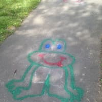 <p>This sidewalk art encourages kids to hop like frogs. </p>