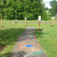 <p>The trail includes 10 signs along a paved path decorated with artwork. It was installed last week by volunteers. </p>
