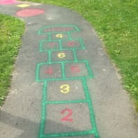 <p>The trail includes a pint-size hopscotch for kids to try. </p>
