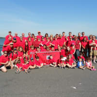 <p>Members of &quot;Russel&#x27;s Legacy&quot; gather at the Brain Tumor Walk NY in red shirts to honor the memory of Russell Paniccia, who died in 2000 after a two-year battle with a brain tumor. </p>