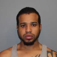 <p>Manoah &quot;Tony&quot; Dunbar, 29, of Taylor Avenue in Norwalk, was arrested by Norwalk police Thursday in connection with an alleged pot operation.</p>