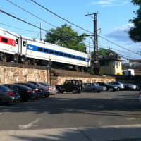 <p>One of the trains delayed by the stuck drawbridge near the Norwalk River between South Norwalk and East Norwalk Friday.</p>