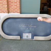 <p>One of the confiscated poker tables from Casino Royal in Norwalk.</p>