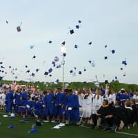 <p>Members of Wilton High School&#x27;s Class of 2013 throw their caps into the air at the close of Saturday&#x27;s graduation ceremony.</p>