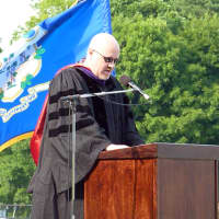 <p>Wilton High School Social Studies teacher Don Schels speaks during Saturday&#x27;s graduation.</p>