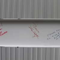 <p>A 20-foot-long steel I-beam rests on two sawhorses at construction site for the Westport Weston Family Y. Donors and Y campaign leaders are adding their signatures and congratulatory notes to it. </p>