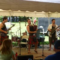 <p>Festive Scottish music under the tent Saturday at the Round Hill Highland Games at Cranbury Park in Norwalk.</p>