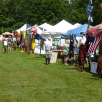 <p>Some of the vendors at the Round Hill Highland Games at Cranbury Park in Norwalk Saturday.</p>