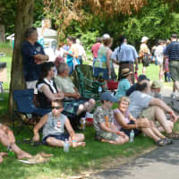 <p>Some attendees sought shade Saturday at the 90th annual Round Hill Highland Games at Cranbury Park in Norwalk.</p>