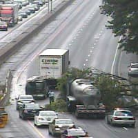 <p>A tree is blocking two lanes of northbound I-95 near Exit 5 in Greenwich at about 8:50 a.m. Thursday, causing huge traffic backups. </p>