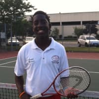 <p>Norwalk&#x27;s Marcus Hooks, a recent graduate of Brien McMahon, teaches tennis at Slammer Tennis World with coach Marvin Tyler.</p>
