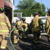 <p>New Canaan Fire Company puts out a blaze at AC Auto Body &amp; Mechanic at about 5 p.m. Monday.</p>