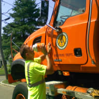 <p>Greenburgh Highway Department workers fought the heat on the job Wednesday.</p>