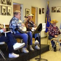 <p>The Lewisboro Senior Adult jugband &quot;The Senior Stompers,&quot; led by Joan Zurrel, play at a recent gathering of the group. </p>