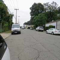 <p>Marbledale Road in Tuckahoe is lined with parked cars on both sides of the street.</p>