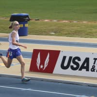 <p>Angela Saidman of the Wilton Running Club strides to a third place finish in the 1,500 meters at the Junior Olympic national championships Sunday in North Carolina.</p>