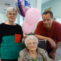 <p>Anne Finkler with her daughter Ellen and son-in-law Lowell Henry at Andrus on Hudson&#x27;s 100th birthday party.</p>