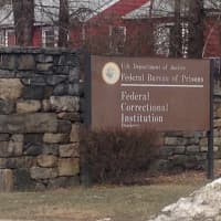 <p>Only the signs are visible from the road for the Federal Correctional Institution in Danbury. </p>