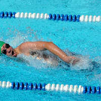 <p>Ossining swimmer Tommy Overacker powers a freestyle lap winning the 50-yard event.</p>