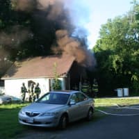 <p>Firefighters were able to put out a garage fire on Spring Hill Avenue in Norwalk within 10 minutes Tuesday. </p>