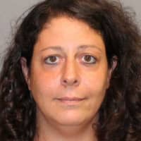 <p>Vanessa Hickey, 37,  of Stamford was charged with larceny and conspiracy Tuesday by Norwalk police.</p>