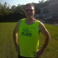<p>Dobbs Ferry realtor and fitness trainer Michael Gibbons will run the Chicago Marathon in October to raise funding to fight childhood obesity.</p>