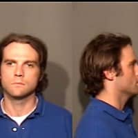 <p>Adam Jones, of New Canaan, was charged with first-degree larceny and conspiracy to commit first-degree larceny.</p>