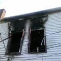 <p>The fire at the North Salem apartment caused the Mullanes to flee to an adjacent roof. </p>