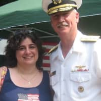 <p>Hastings businesswoman Nicole Shyrock with U.S. Navy Rear Admiral Townsend Tim Alexander at a Memorial Day event.</p>