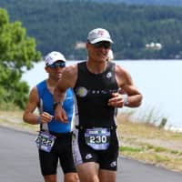 <p>Cos Cob&#x27;s Mike Christie runs during the Ironman race in Coeur d&#x27;Alene, Idaho in June.</p>