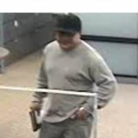 <p>The suspect in Thursday&#x27;s bank robbery in Greenwich, above, is also sought in another bank robbery in town as well as one in Linden, N.J. </p>